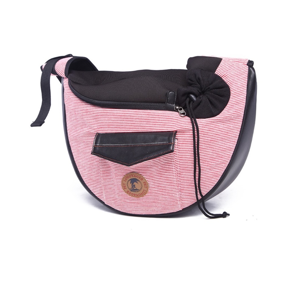 Pet carrier bag strap has a cell phone holder. The strap is padded like new.